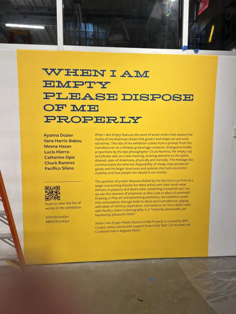 A yellow sign with the words " when i am empty please dispose of me properly ".